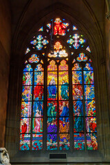 Multicolored stained glass windows in the Catholic Cathedral of St. Vitus in Prague