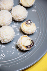 rafaello cookies on a plate with jewelry 