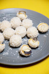 rafaello cookies on a plate with jewelry 