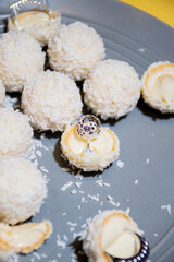 rafaello cookies on a plate with jewelry 