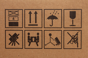 Packaging symbols to indicate which direction is up, avoid dam conditions, fragile item , not to...
