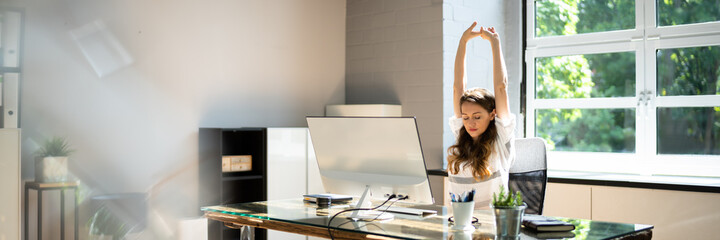Stretch Workout Exercise At Desk Office. Woman