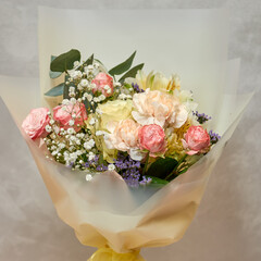 Fresh bouquet of colorful mixed flowers. European floral shop concept. Flowers delivery