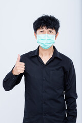 Asian men wear masks to prevent PM.5 dust and The coronavirus epidemic is spreading isolated white background.