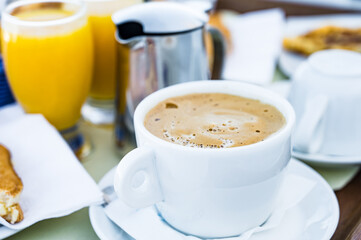 Close-up of cup of coffee. Breakfast composition.