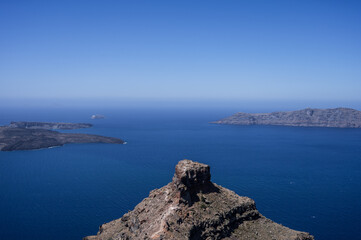 Skaros Rock on Santorini island. View of Aegean sea and caldera. Scenic landscape.