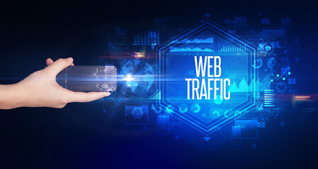 hand holding wireless peripheral, cyber security concept