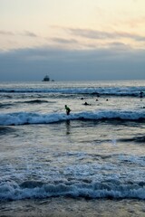 Fototapeta na wymiar surfer at sunset