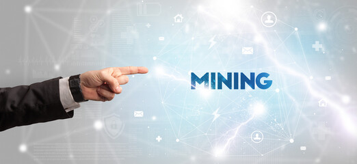 Hand pointing at inscription concept