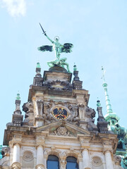Fototapeta na wymiar Historic town hall in the city of Hamburg with blue sky