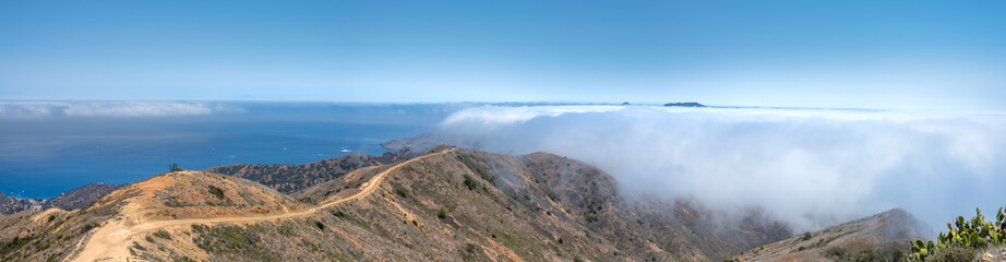 Clouds hug the windward side of Catalina Island along the ridge line of the Trans Catalina Trail