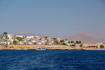 Fototapeta na wymiar Egypt Sharm el Sheikh - July 23, 2021. Panorama from the sea. View of the city.