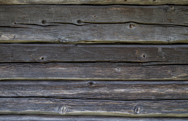 Front view of an old, weathered and aged wooden wall. Abstract full frame textured background.