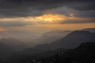 Fototapeta premium Beautiful cloudy landscape sunset in Mashwara, Ibb government, Yemen. Yemen landscape view for tourism.