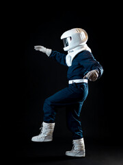 An astronaut walks in low-gravity conditions. The hero