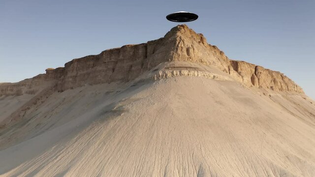 Flying Sacuer over Mountain top in the desert, aerial view
drone view from Mount Zin in Israel, alien concept
