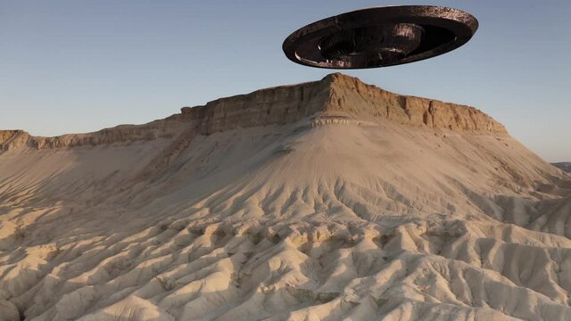 Flying Sacuer Ufo takes off from desert mountain, aerial view
drone view from mount zin, Israel, alien concept
