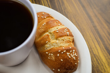 Taza de Cafe y Pan Guatemalteco. Postre Guatemalteco, llamado pan de manteca con cafe.