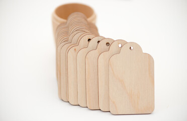 old fashioned wooden tags and objects arranged on a light background