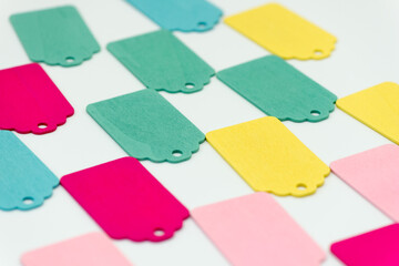 retro tags in various colors on a light background