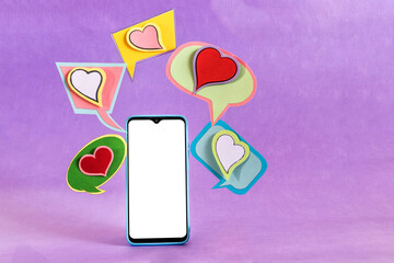 Mobile phone and dialogue bubbles with hearts. Dating app concept.