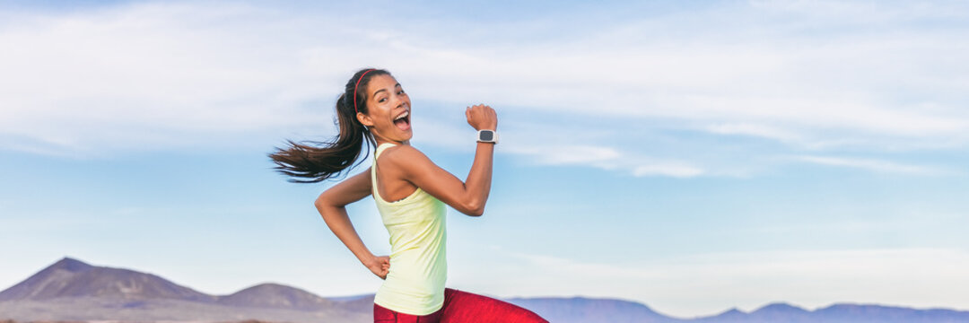 Fun fitness workout personal trainer athlete woman happy making goofy face excited while running funny to motivate. Exercise outside to burn fat training outdoor on trail run in nature banner.