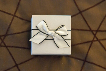 White brides jewelry box with white bow and lace