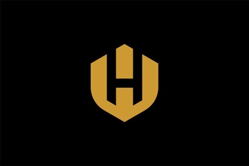 Obraz premium Letter H shield logo design vector. Monogram H type abstract symbol.