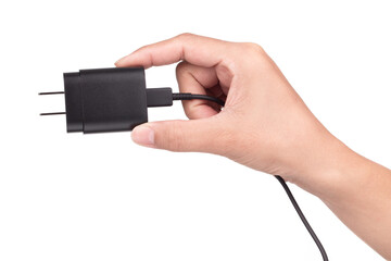 hand holding Mobile phone charger isolated on a white background.