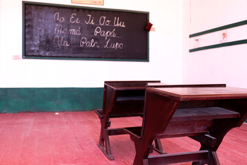 classroom with blackboard in an abandoned town