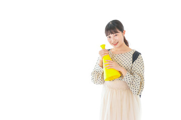 Obraz premium スポーツの応援をする若い女性
