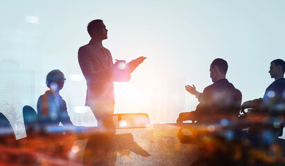 Group of business people outlines with lit background