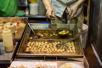 Street food stall at night in Hong Kong