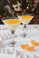 Christmas italian dessert tangerine panna cotta martini glass.