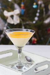 Christmas italian dessert tangerine panna cotta martini glass.