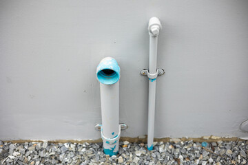 Household water supply system installed in the house. There are sewer pipes and clean water and faucets.