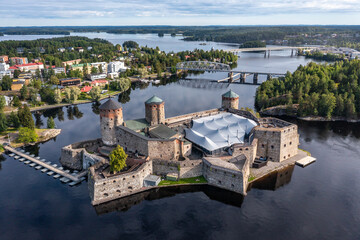 Fototapeta na wymiar Medieval Castle Olavinlinna in Savonlinna, Finland. Aerial Drone view.