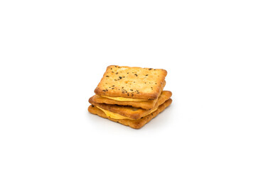 Cheese crackers with dried rosemary isolated on white background.