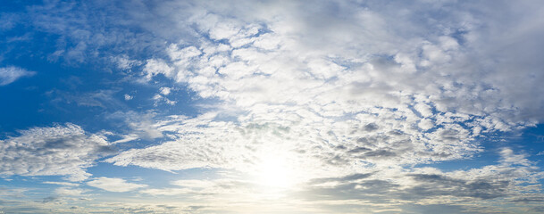 Naklejka na ściany i meble Cloudy sky and sunshine panorama background image