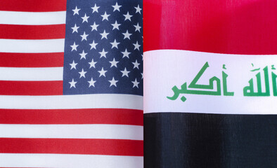 fragments of the national flags of the United States and Iraq in close-up
