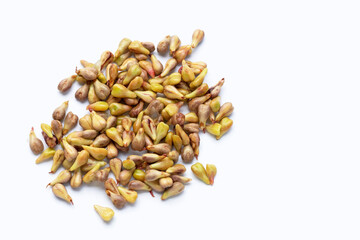 Grape seeds on white background.