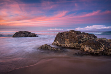 Pink and orange sunset on Tugun beach, Queensland Australia