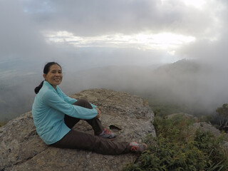 The view set on the top of the hill covered with clouds, can't see the sunset.