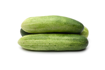 Organic green diet vegetable cucumbers on isolated white background