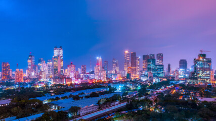 The glowing skyline of downtown Mumbai- Lower Parel and Worli at night, consisting of many...