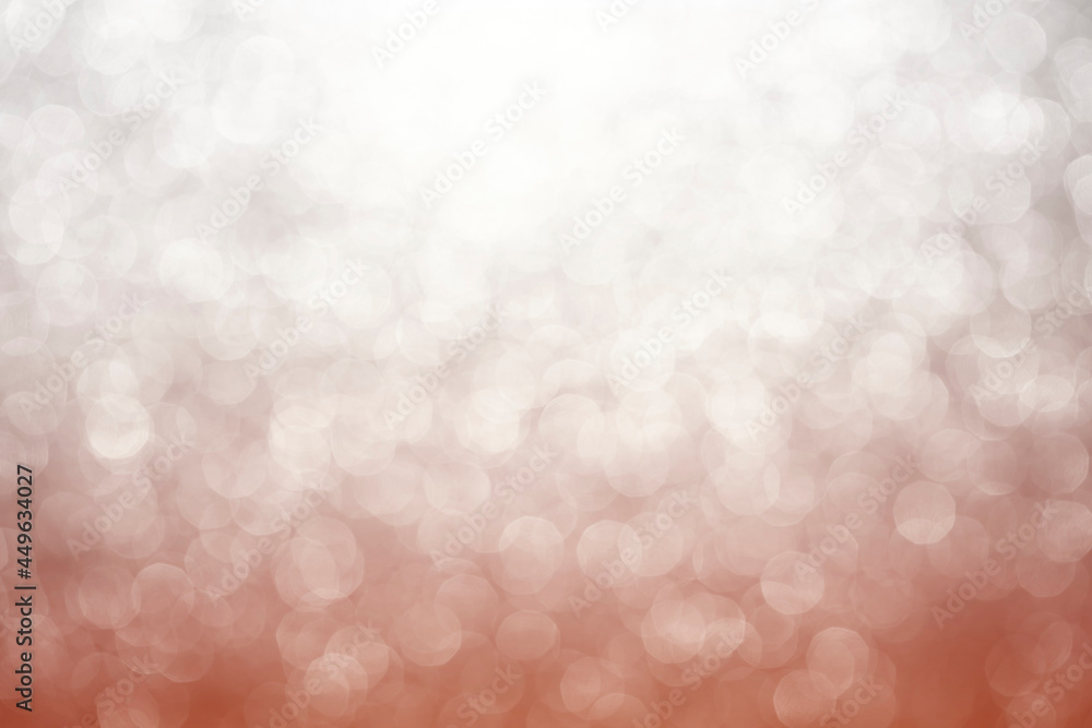 Poster orange color abstract bacground withe blurred defocused bokeh light for template.