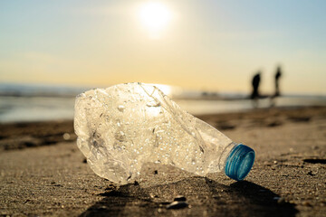 Plastic bottle on sea shore, Garbage caused by our negligence