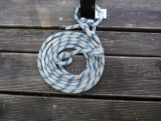 rope folded in a ring on the pier