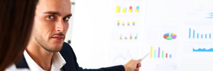 Fototapeta premium Group of people deliberate on white board problem