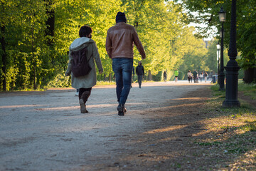 Couple Walking in a Public City Park